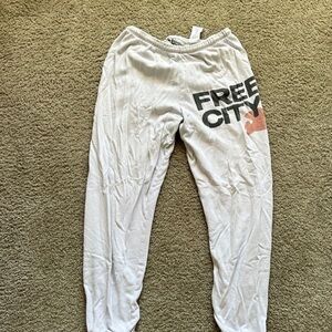 Freecity White Ankle Pants with Black and Orange Logo